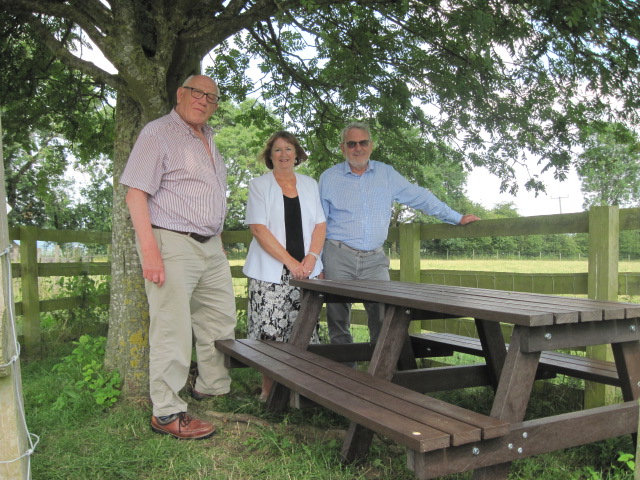 Malcom Thomas, Howard Davies and Linda Scott OBE with the new bench.